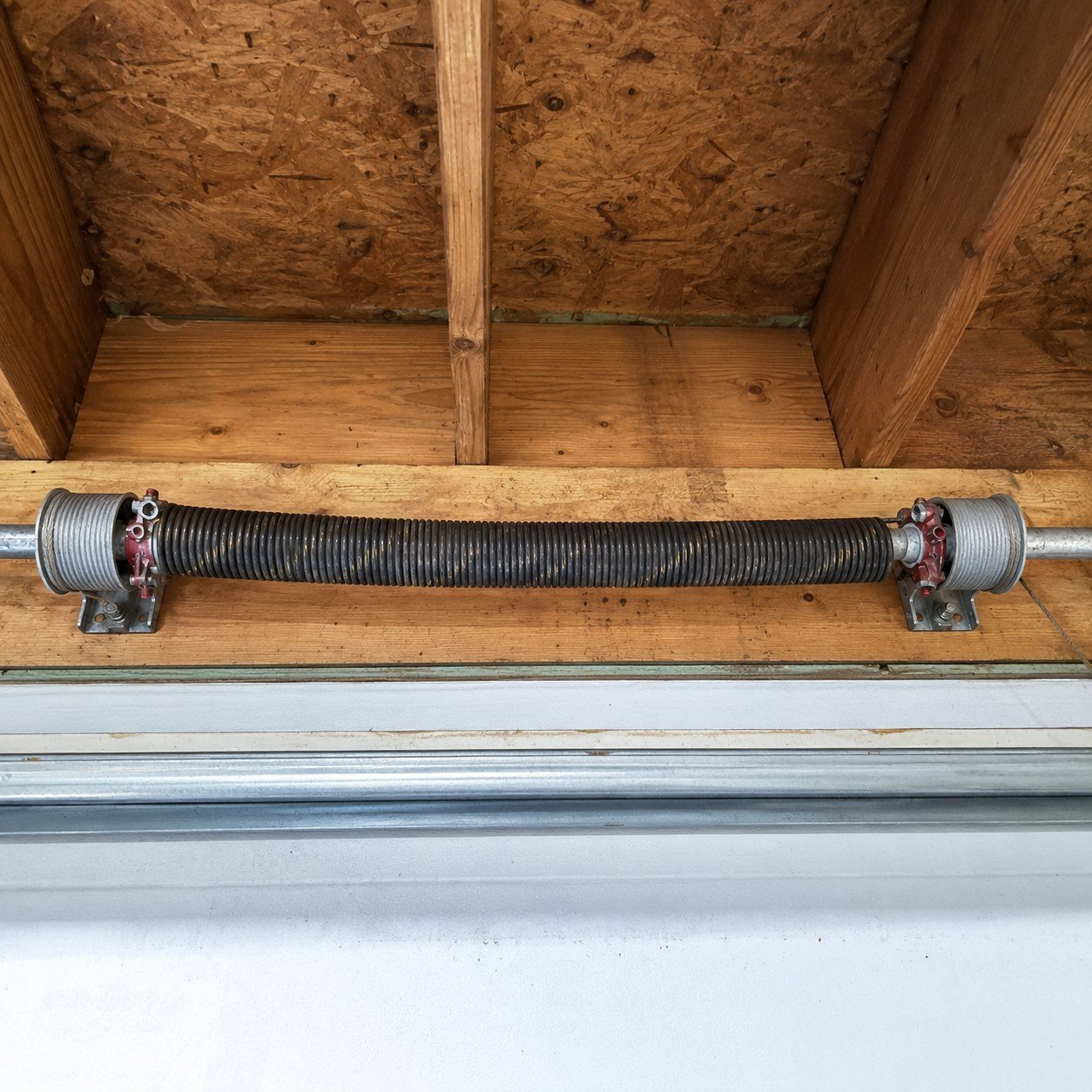 Broken garage door torsion spring replacement