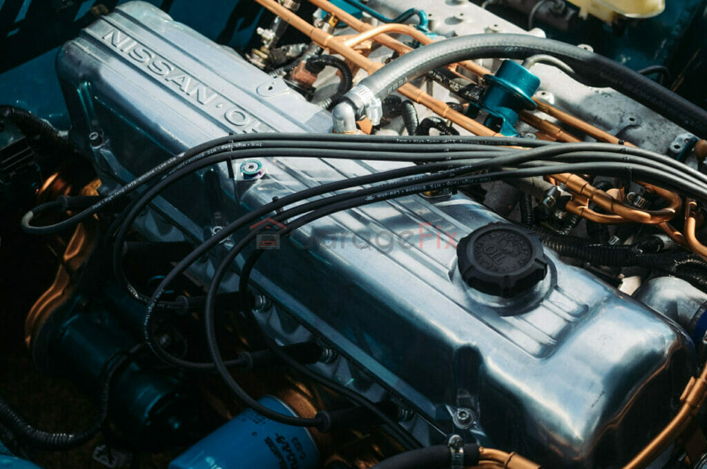 A close up of a blue engine in a car.