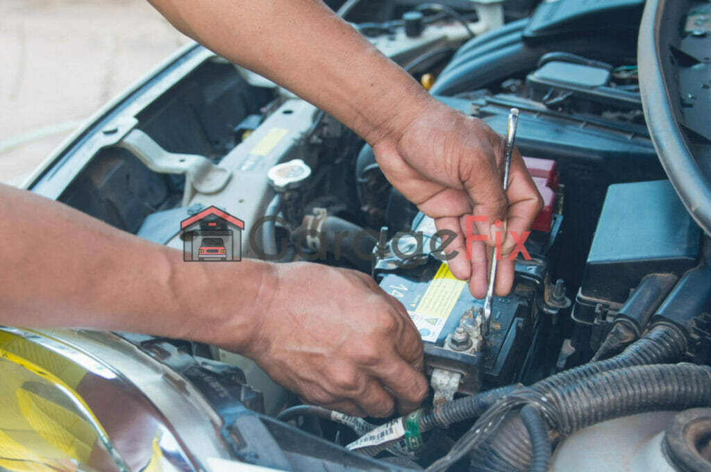 A man working on the engine of a car.