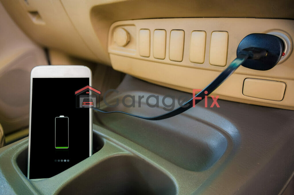 A cell phone is plugged into a charger in a car.