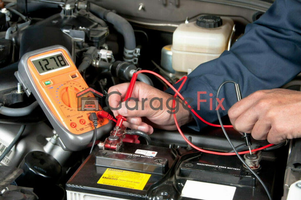 A mechanic checking the voltage of a car battery.